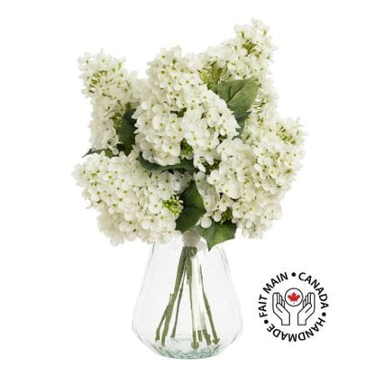 Artificial white hydrangea flower bouquet in a vase